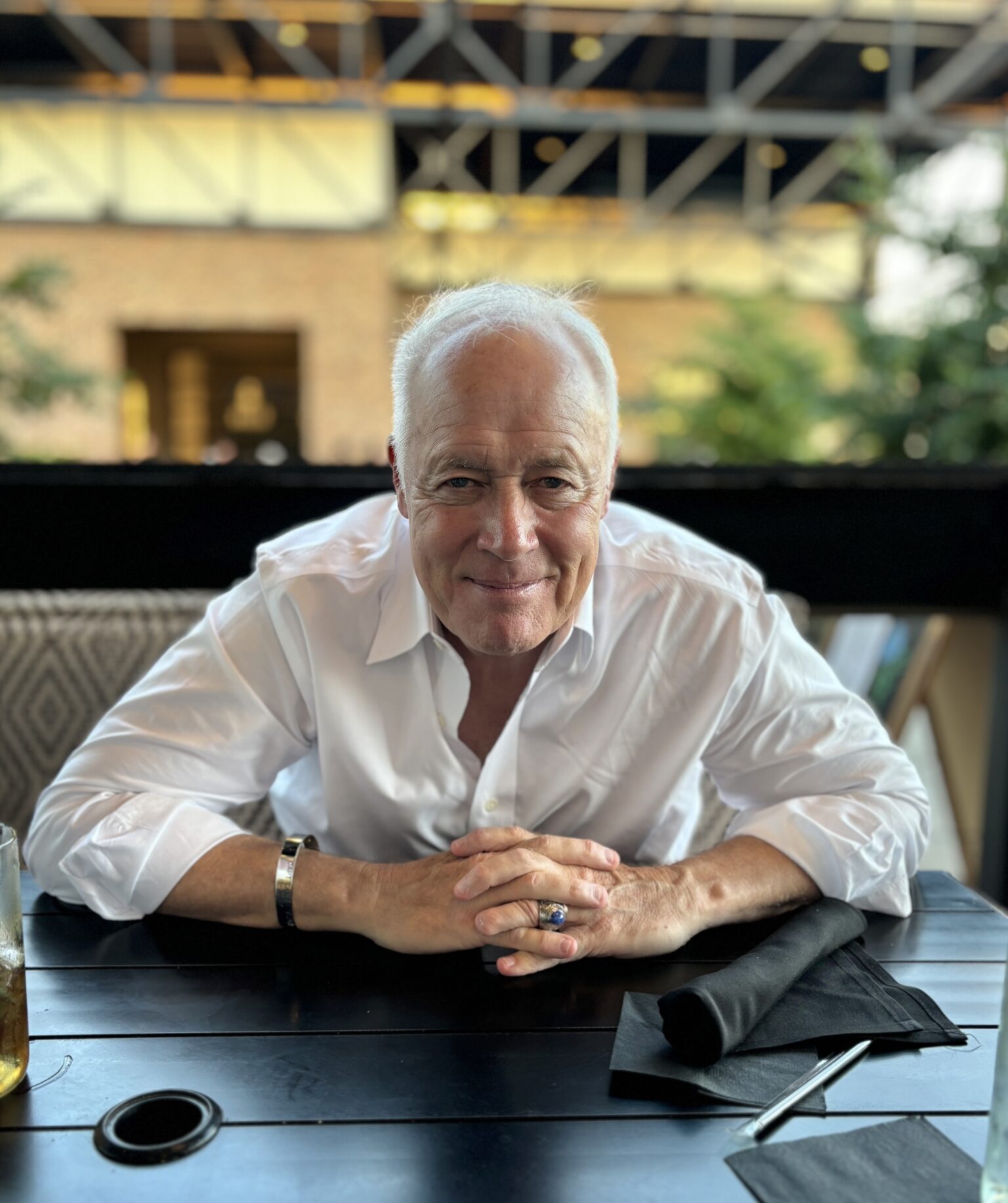 Lt. General Richard Newton USAF (Ret) leaning on a table